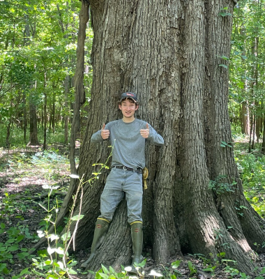 nate with a big oak tree